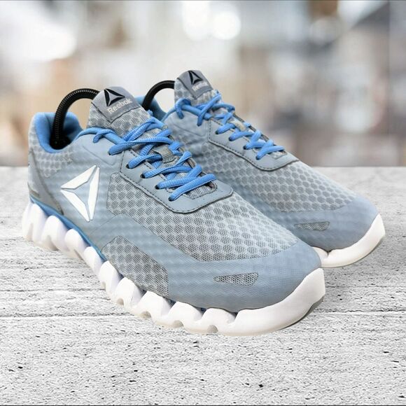 Reebok Woman Size 9.5  Zig Evolution Sky Blue‎ BS7660 Wide Running Jogging - Picture 1 of 10